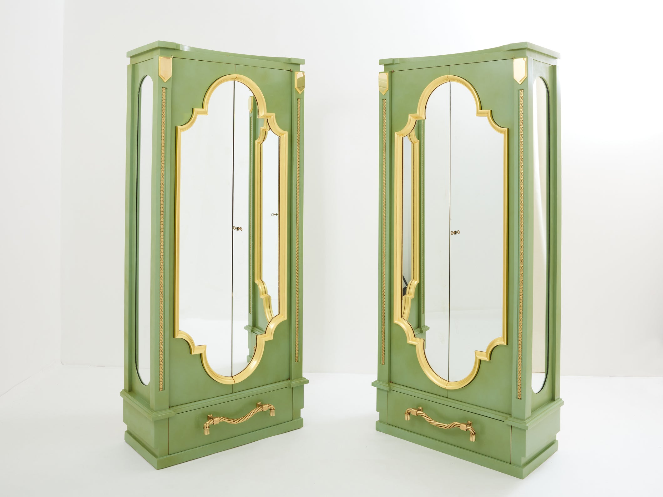André Arbus pair of celadon green lacquered wardrobes gilt brass 1930