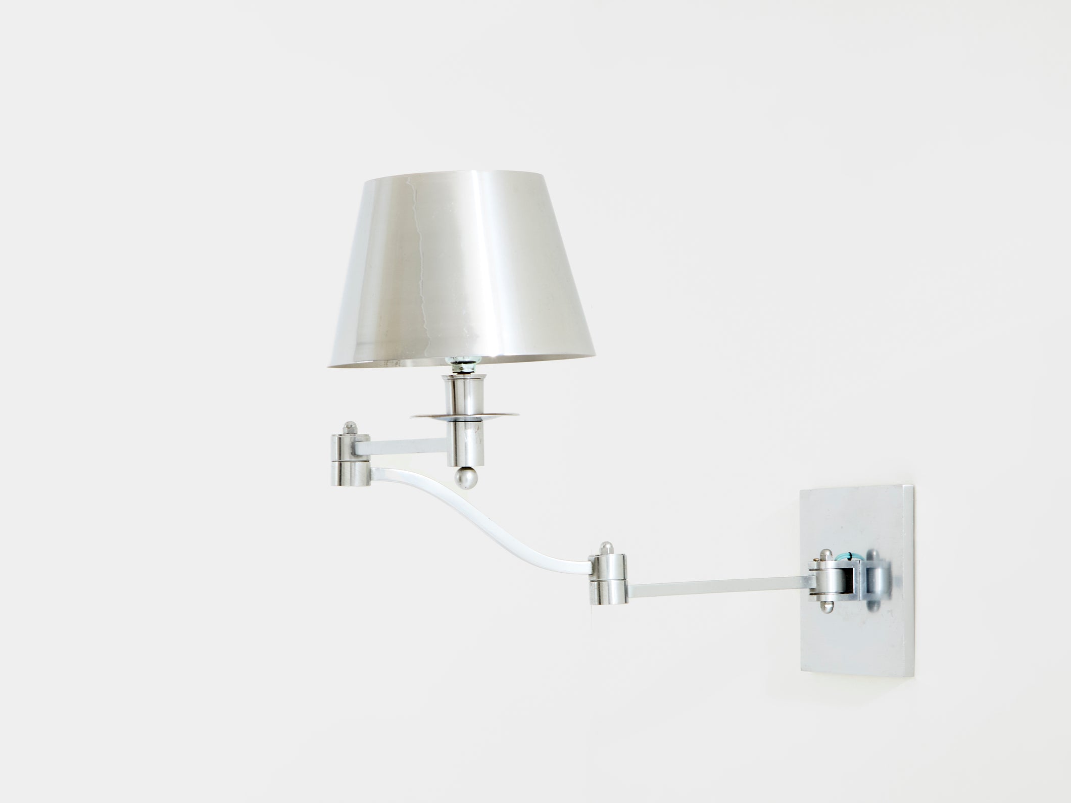 Maison Charles single brushed steel adjustable swing-arm sconce 1960s