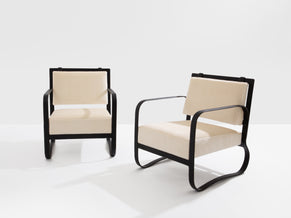 Jacques Adnet paire de fauteuils cuir noir et velours de mohair 1950