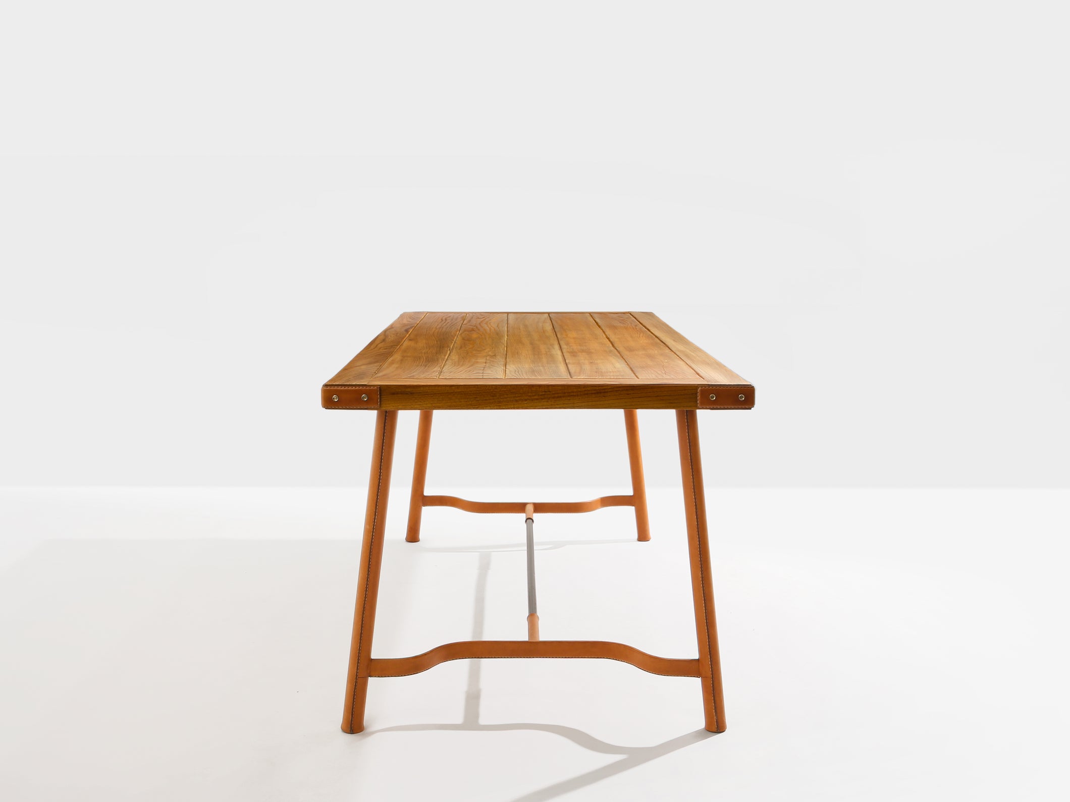 Jacques Adnet oakwood and red leather dining table 1950