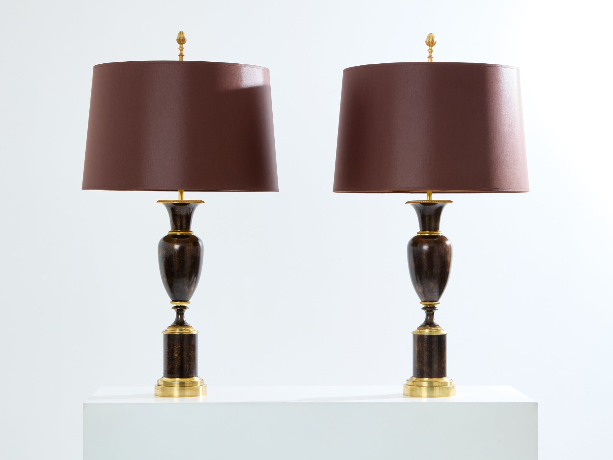 Maison Charles pair of patinated brass lamps 1950s