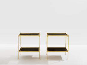 Maison Jansen pair of two-tier side tables brass black leather 1960s