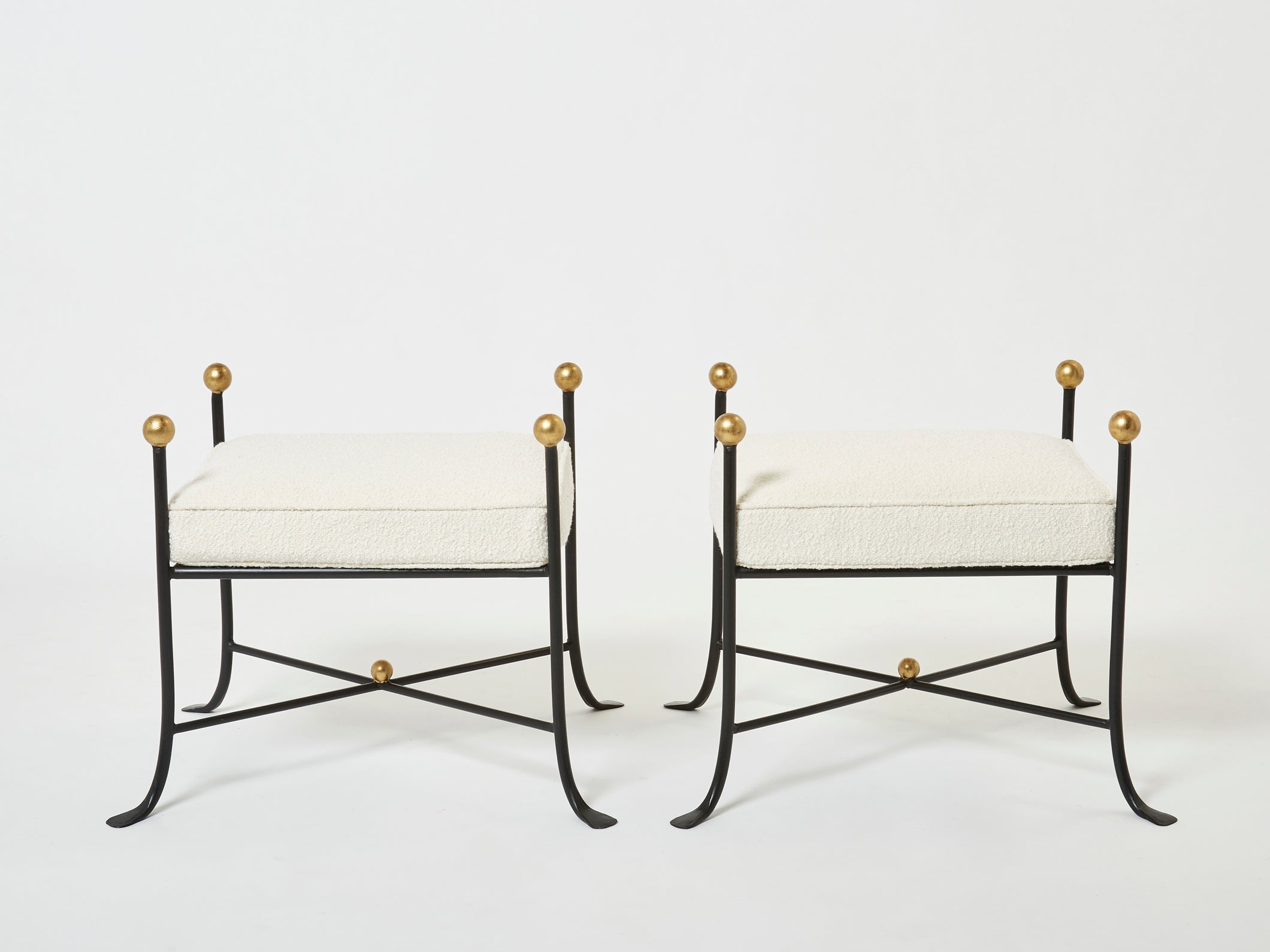 Pair of French 1950s wrought iron and gold leaf bouclé stools