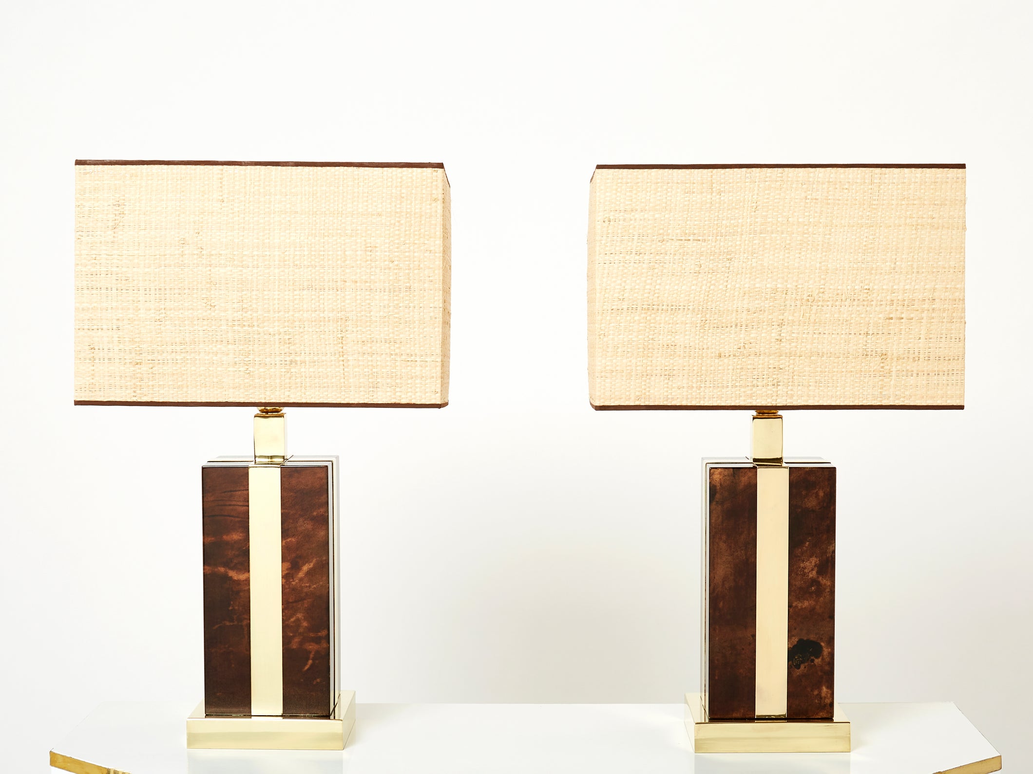 Pair of Italian Aldo Tura goatskin brass rattan table lamps 1970s