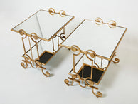 Paire de tables d’appoint en fer forgé dorée et miroirs vers 1950
