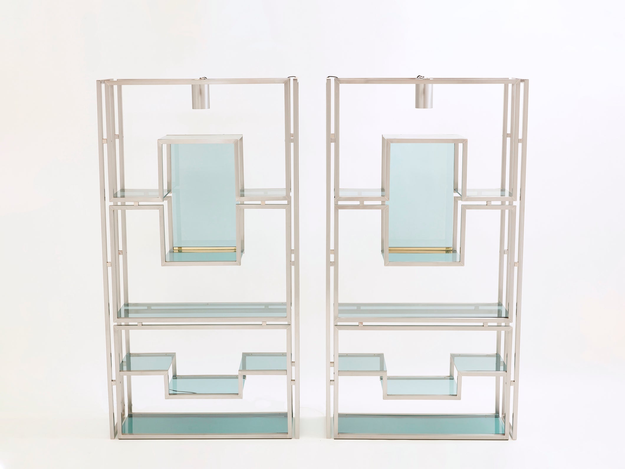 Pair of Kim Moltzer brushed steel brass green lucite shelving units 1970s