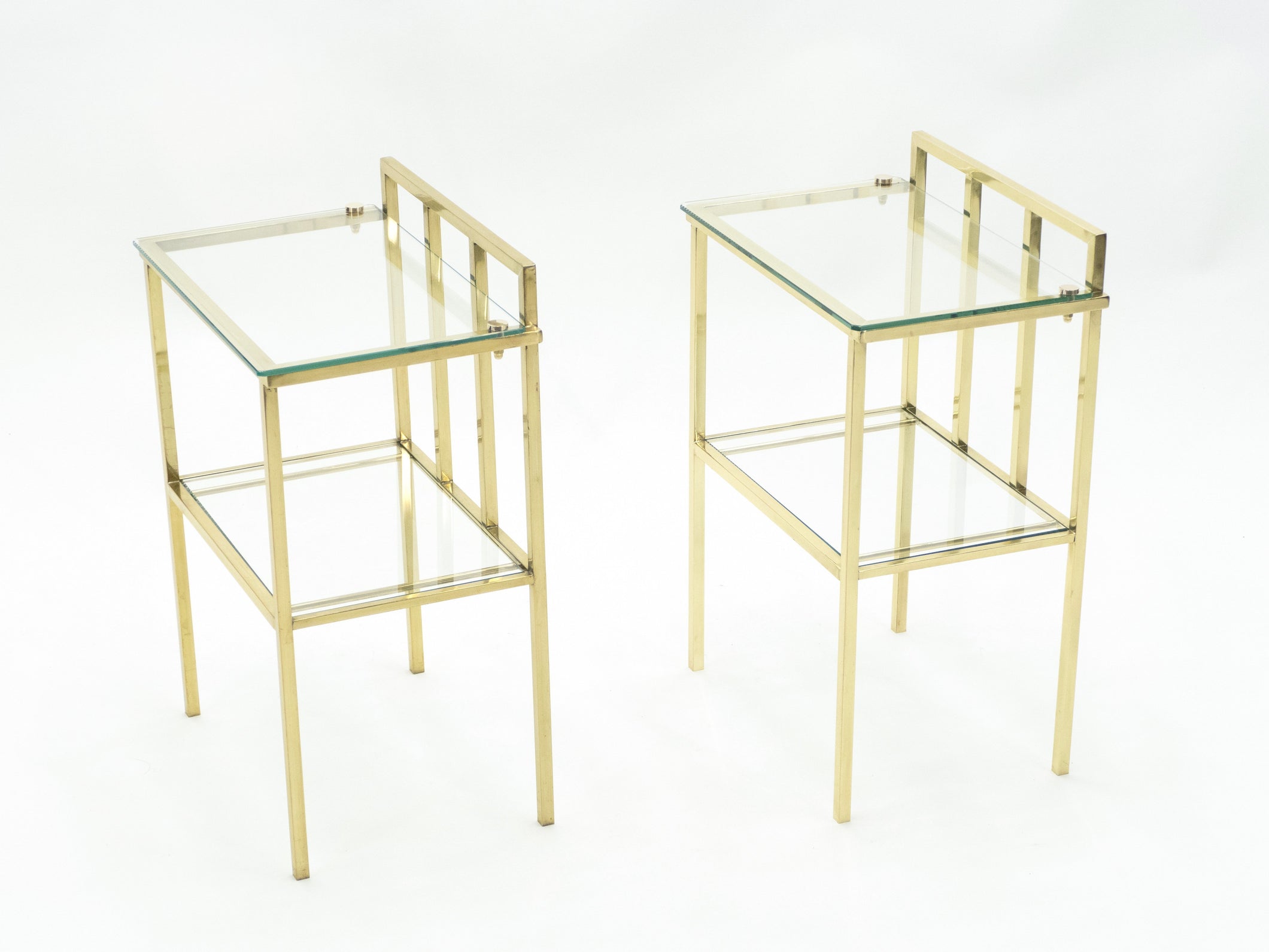 French brass two-tier glass end tables Attr. Marc Duplantier 1960s