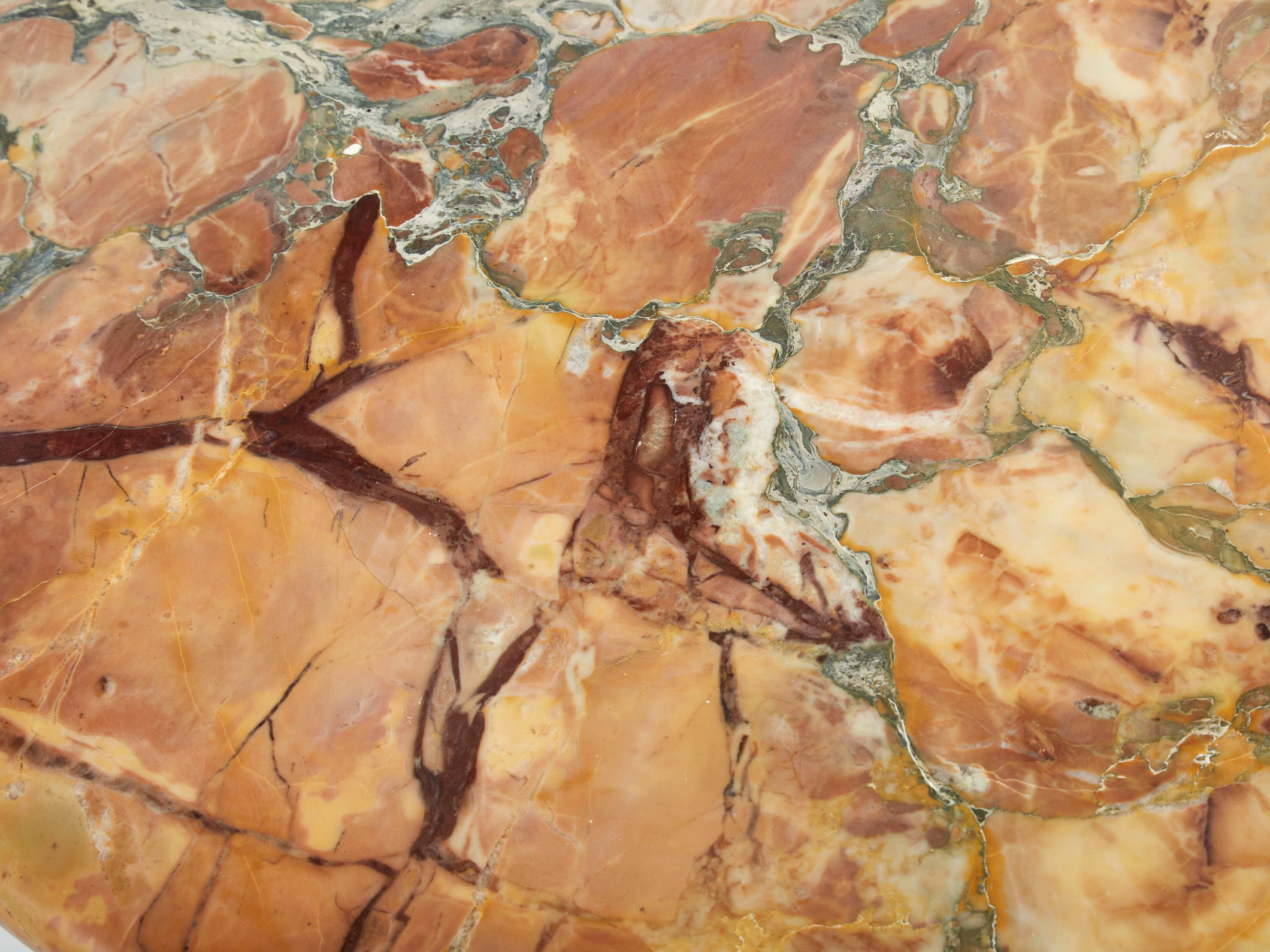 Table basse oeil en marbre sicilien vers 1980
