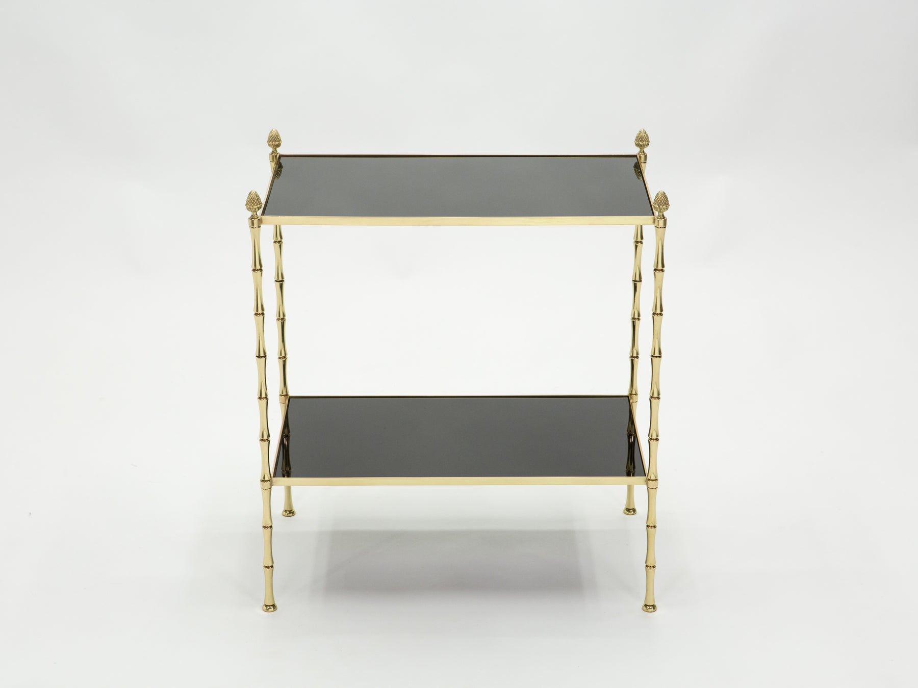 Pair of French Maison Baguès bamboo brass black top two-tier end tables 1960s