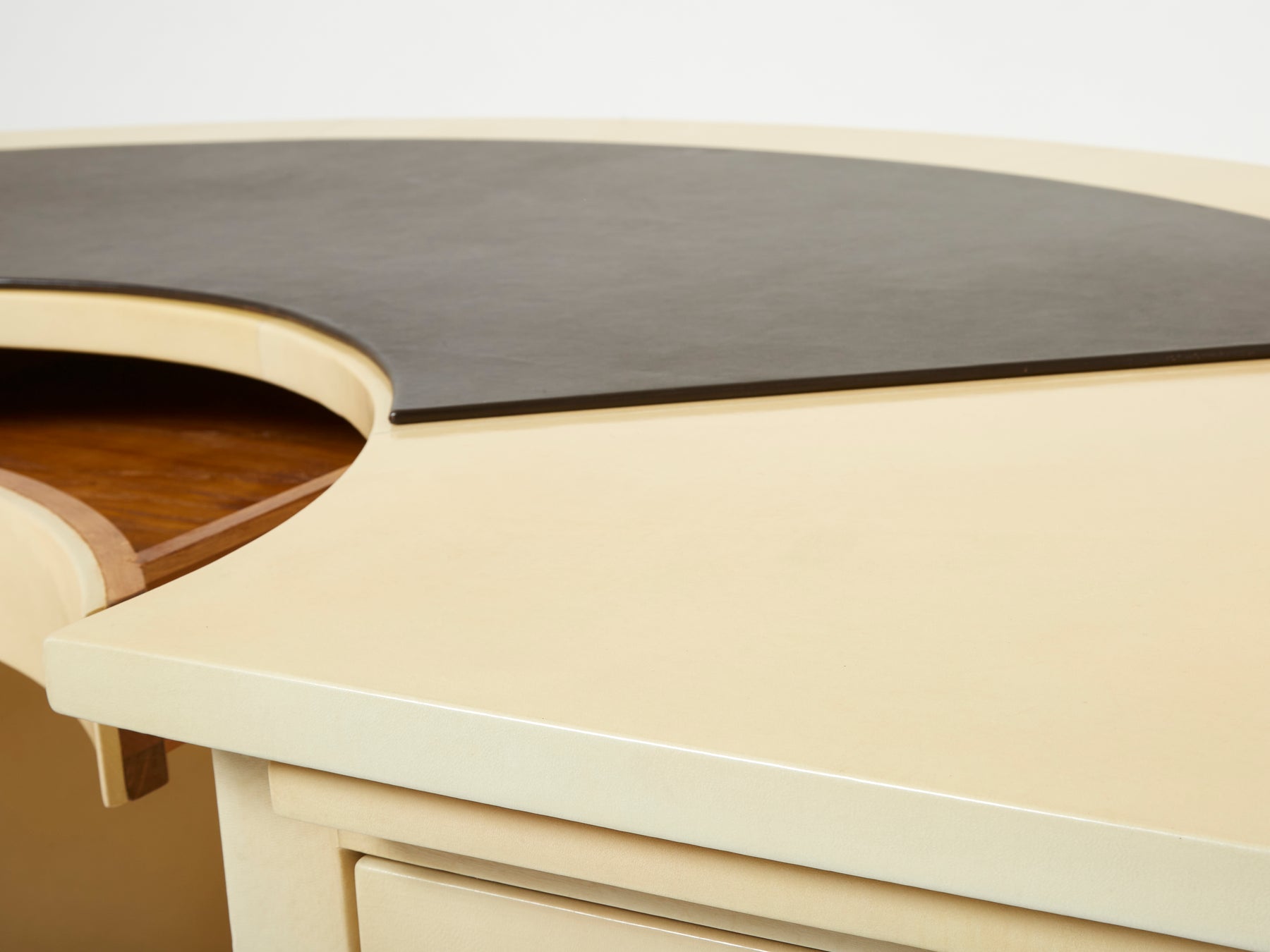 Unique Jacques Adnet curved parchment desk 1940